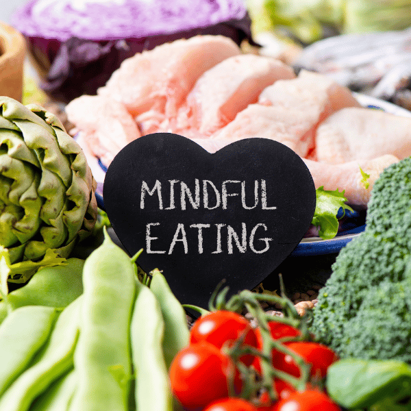 vegetables with a sign that says Mindful Eating